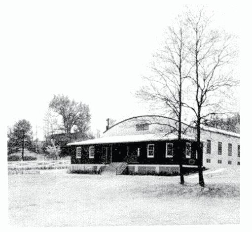 Higgs 19.jpg - Cliffside offices and gym, at east end of the cabin row, which is to the right in the picture..